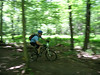 24 Hours of Big Bear, 6/2007 : Mountain bike racing for 24 hours straight was popularized by outdoor entrepreneurs based in the Canaan Valley and the 24 Hours of Big Bear derives from the original 24 Hours of Canaan. Relay teams - and some soloists - race laps to see how many laps they can complete from noon to noon over a weekend. The course at Big Bear Camplands, a private RV camping resort in northern WVA, is 13 miles of rocky single-track and double-track trails with about 1,500 ft. in elevation change. Mark did his first race with Team Chunder Pig, made up from boating and mountain biking friends in the Allegheny Highlands region. We - a most serious group of competitors, wink, wink - did better than expected but didn't come close to the best competition. Everyone completed three laps and Mark beat admittedly-low pre-race time expectations. The race was fun - even at 3 a.m. - as more than 500 people gathered to test their endurance in this unusual fashion. Thanks to Honey Smith for taking many of these pictures during the race.