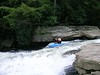 Swallow Falls on Top Yough, MD 5/2005 : Swallow Falls is the first rapid on a section of the Youghiogheny that starts at Swallow Falls State Park in western Maryland. The falls is an 18 foot slide that marks the beginning of a picturesque gorge full of wonderfully technical whitewater. Swallow Falls State Park contains the state's largest waterfall - Muddy Creek Falls - and an impressive stand of virgin hemlocks. The level was 1.7 @ Sang Run.